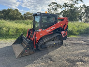 Red skid steer
