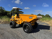 Yellow mini dump truck