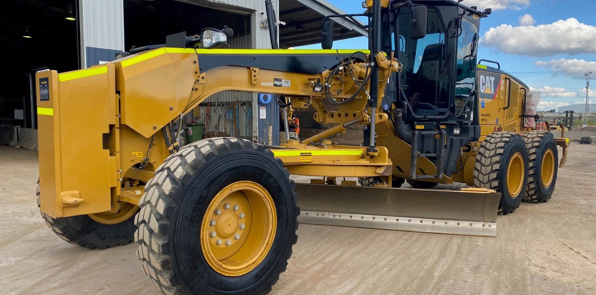 Yellow Motor grader